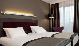 Отель Hotel 3 Trio Белосток Улучшенный двухместный номер с 1 кроватью или 2 отдельными кроватями-15